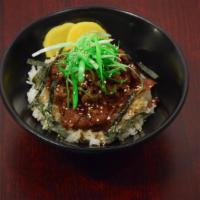 Beef Gyu Don · Thinly sliced marinated beef in sweet savory sauce served over rice. Served on premium rice ...