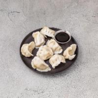9. Steamed Dumpling · 8 pieces.