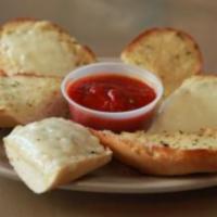 Garlic Bread Appetizer · Served with a side of homemade marinara sauce.