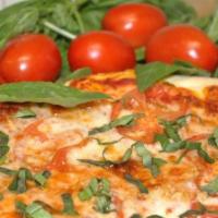 Margarita Pizza · Roma tomatoes, fresh basil and garlic.
