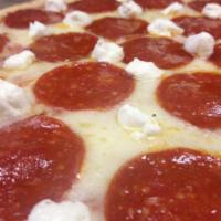 Classic Pepperoni and Goat Cheese Pizza · Pepperoni topped with goat cheese.