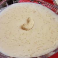 Kheer Rice Pudding · Kheer is Indian rice pudding made with only three basic ingredients- rice, milk and sugar co...