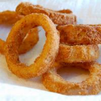 Onion Rings · A basket of our fresh, hand breaded onion rings, served with ranch.