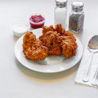 Chicken Tenders Basket · 4 hand breaded chicken tenders served with 2 sides.