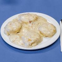 Buiscuits and Gravy · Fluffy biscuits topped with sausage gravy.