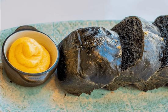 Ada’s Mini Black Brioche Loaf · charred orange butter.