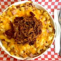 The Drunken Pig · The #Basic with elbow pasta, bacon, and ham. Topped with slow-roasted pulled pork.