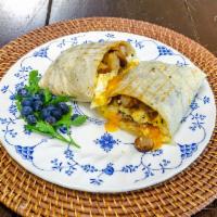 Breakfast  Burrito  · Srambled egg, potato, cheese, and salsa. Choice of sausage link, bacon, or chorizo. Extra me...