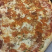Chicken Parmigiana Pizza · Crispy chicken, tomato sauce, mozzarella and Romano cheese.