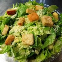 Caesar Salad · We start with locally fresh organic romaine lettuce. We chop it into edible size pieces. The...