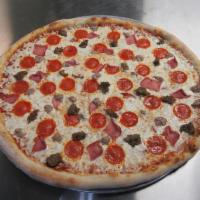 The Greasy Man's Special Pizza · Our pizzas are made fresh to order. We start off with a classic New York style three-day slo...