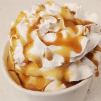 Caramel Sundae · Scoops of vanilla ice cream with caramel, whip cream, and Hershey's caramel syrup.