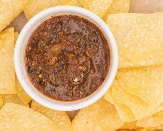 Chips & Salsa · House made fire roasted salsa served warm with chips.