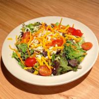 House Salad · Mixed greens, carrots, tomatoes, pepper jack, cheddar, cilantro, choice of dressing.