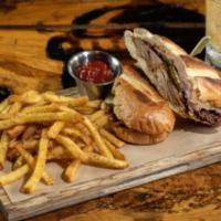 Smoked Pork Cubano Sandwich · Sliced ham, smoked pork, Swiss, pickles, beer mustard and chipotle mayo, french fries.