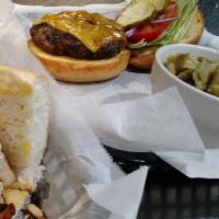 Cajun Burger · Joe's bayou burger smothered in spicy Cajun seasoning and topped with melted monterrey Jack ...