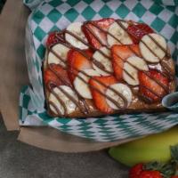 No P or J Toast  · Strawberry, Banana, Almond Butter, Nutella & Honey Drizzle on Sourdough Bread. 