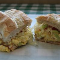 Egg Salad Sandwich · Egg salad, lettuce and tomatoes. Served on your choice of bread.