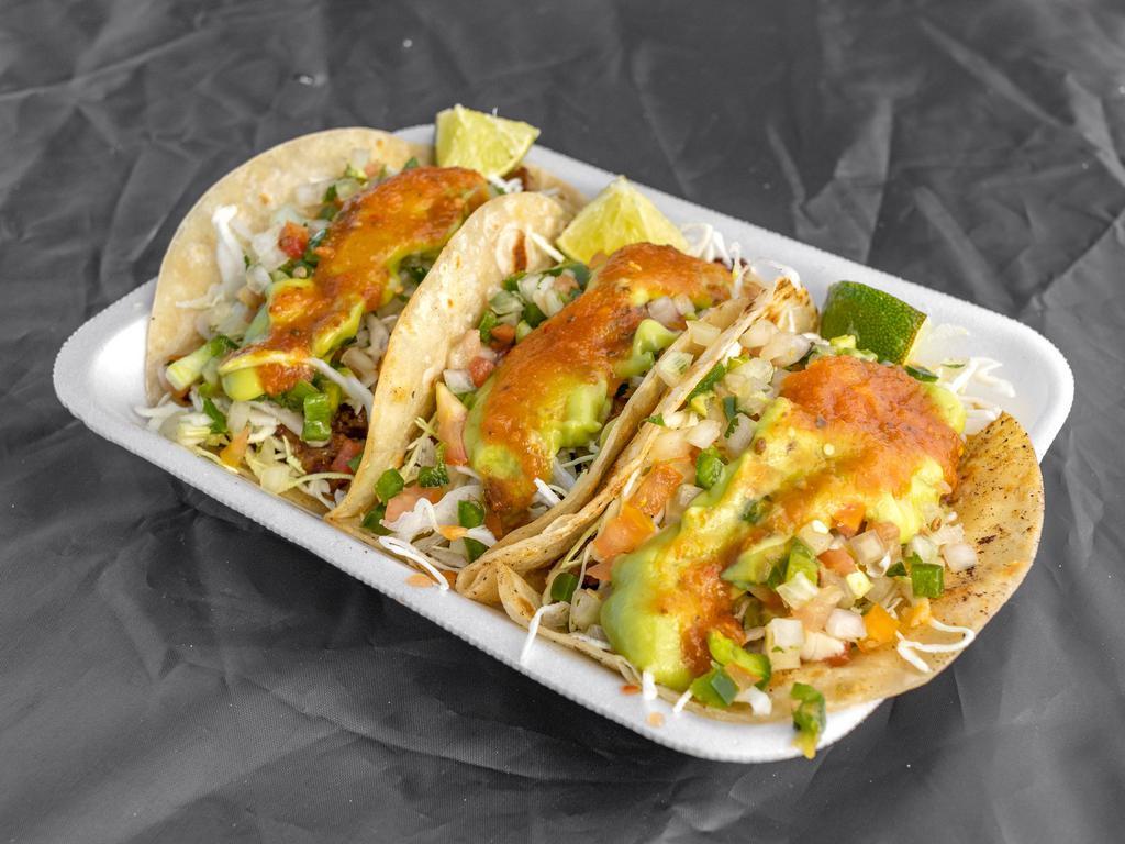 Tacos · Folded tortilla with a variety of fillings such as meat or beans. 