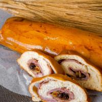 Pan de Jamon (Ham Bread) · Venezuelan traditional ham bread, baked stuffed with smoked ham, bacon, olives and raisins