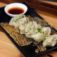 Fried Wonton with Chili Sauce · 6 pieces. Fried wontons with chicken & veggie filling. 1 that is crunchy and chewy on the ou...