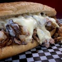 Philly Cheese Steak · Served with grilled mushrooms, grilled onions, 3 swiss cheese on a toasted hoagie.