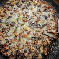 Fun Guy Pizza · Assorted mushrooms, fresh garlic, fresh mozzarella, and truffle oil.