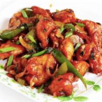 Chilly Chicken · Deep fried batter coated chicken cooked in chili-ginger-garlic paste with spices and tomato ...
