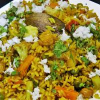 Masala Bhatt · Spicy rice cooked with vegetables and spices.