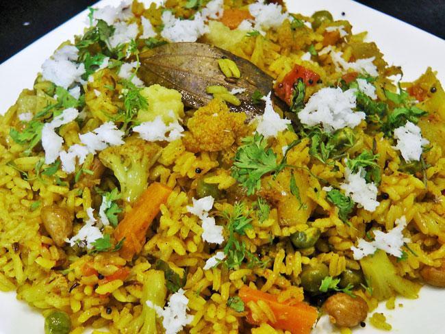 Masala Bhatt · Spicy rice cooked with vegetables and spices.