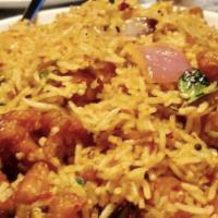 Chicken 65 Fried Rice · Stir fried rice tossed with flavored chicken.