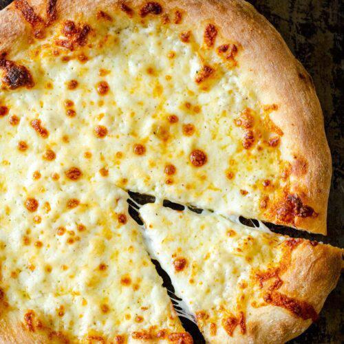 Cheese Pizza · Red pizza sauce, mozerella cheese and cheddar cheese.