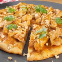 Butter Chicken Meat Pizza · Gourmet shahi sauce, marinated chicken, onion, bell pepper and cheese.