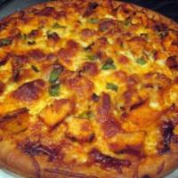 Achari Chicken Pizza · Desi achari flavor sauce, marinated chicken onion, bell pepper tomatoes. Light mozzarella ch...