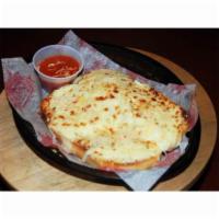 Garlic Bread with Cheese · Bread brushed with a Herbed Garlic Butter, broiled to perfection and served with Housemade M...