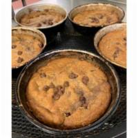 Deep Dish Chocolate Chip Cookie · Served with chocolate chips.
