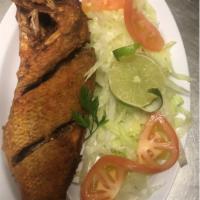 Fried Fish · Paired with the choice of 1 side: fried plantains, fries or rice and beans.