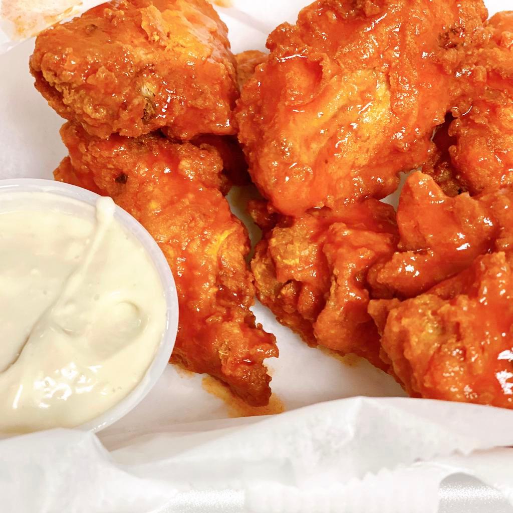 Buffalo Chicken Wings · Fried Buffalo Chicken Wings smother in  Frank's Buffalo Sauce. Available in two sizes. Served with a side of blue cheese (alternate dipping options available). 