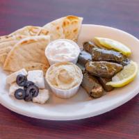 Hummus and Grape Leaves · Served with warm pita bread and feta cheese.
