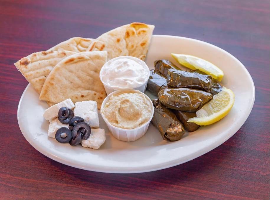Hummus and Grape Leaves · Served with warm pita bread and feta cheese.