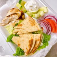 Greek Appetizer · Grilled chicken served with Greek pita, tzatziki (cucumber dip), tomatoes, cucumbers, lettuc...