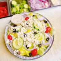 Greek Salad · Lettuce, cucumbers, tomatoes, kalamata olives, red onions and feta cheese.