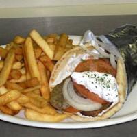 Beef Gyro · Traditional beef gyro, served with tomato, onion and tzatziki on a Greek pita with fries or ...