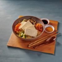 Tofu Noodle Soup · Bean sprout, carrot, zuccini, egg plant, mushroom, radish salad and tofu. Vegetarian.