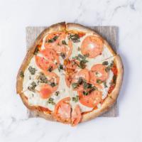 Margherita Pizza · Fresh tomato, fresh mozzarella, garlic and basil.