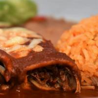 Enchilada Plate · Three corn tortillas stuffed with your choice of Chicken or Cheese, covered in a mild chili ...