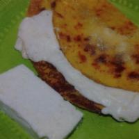 Arepa Maracaibo · Arepa made yellow corn flour and homemade white cheese.