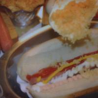 Perro Hawaiano · Hot dog, cheese, crushed (potato chips), pineapple syrup, pink, tartar, garlic sauces and ke...