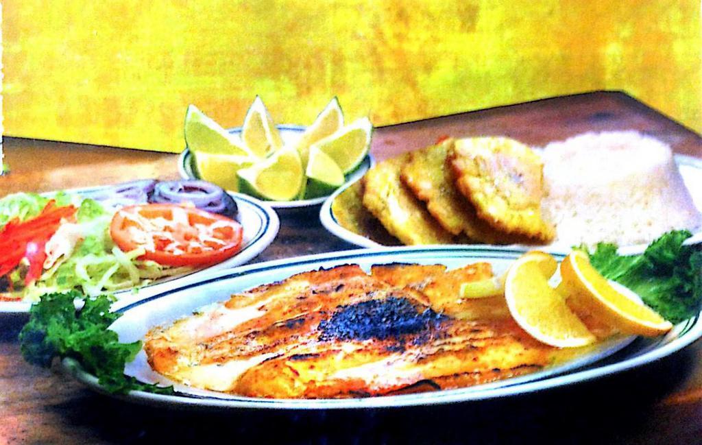 Tilapia Caribe · Grilled and served with 2 side dishes.