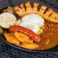 Bandeja Paisa · Red beans, rice, fried pork belly, sausage, grill steak, fried egg sunny up, avocado, sweet ...